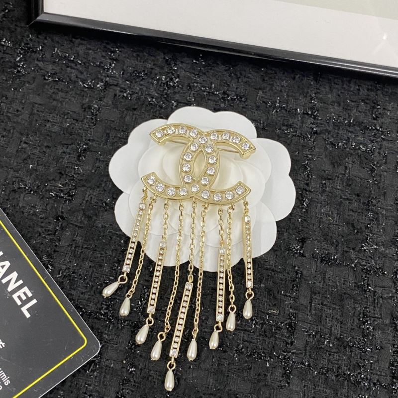 Ch*el brooches